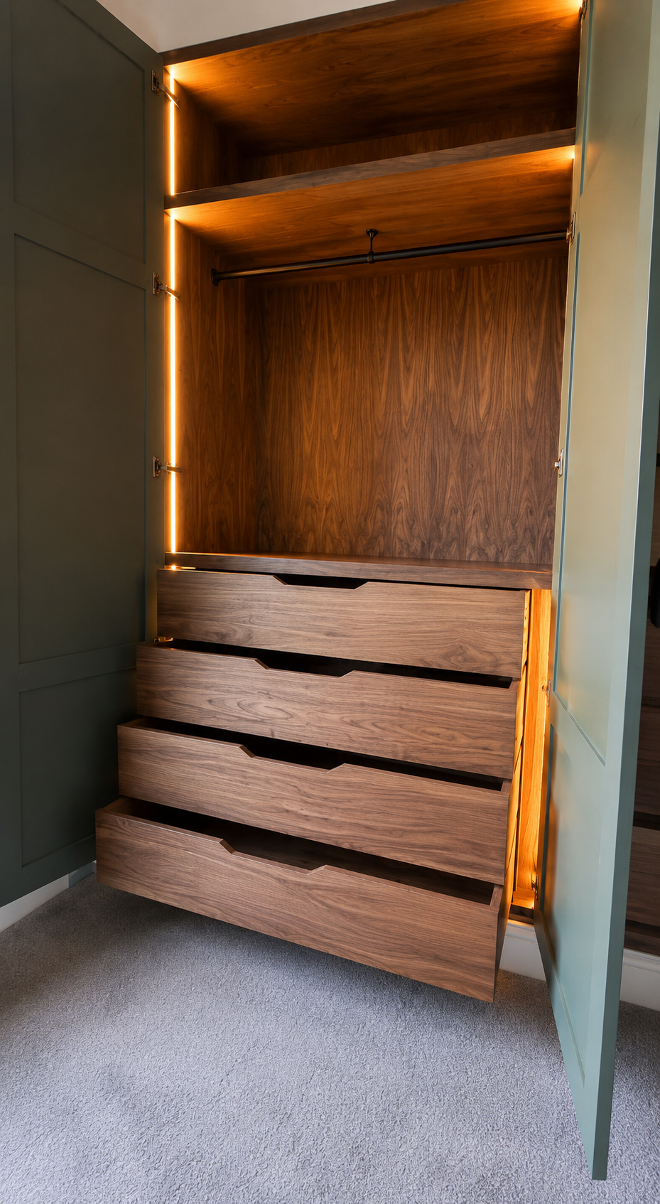 Internal walnut chest of drawers inside the custom wardrobe system